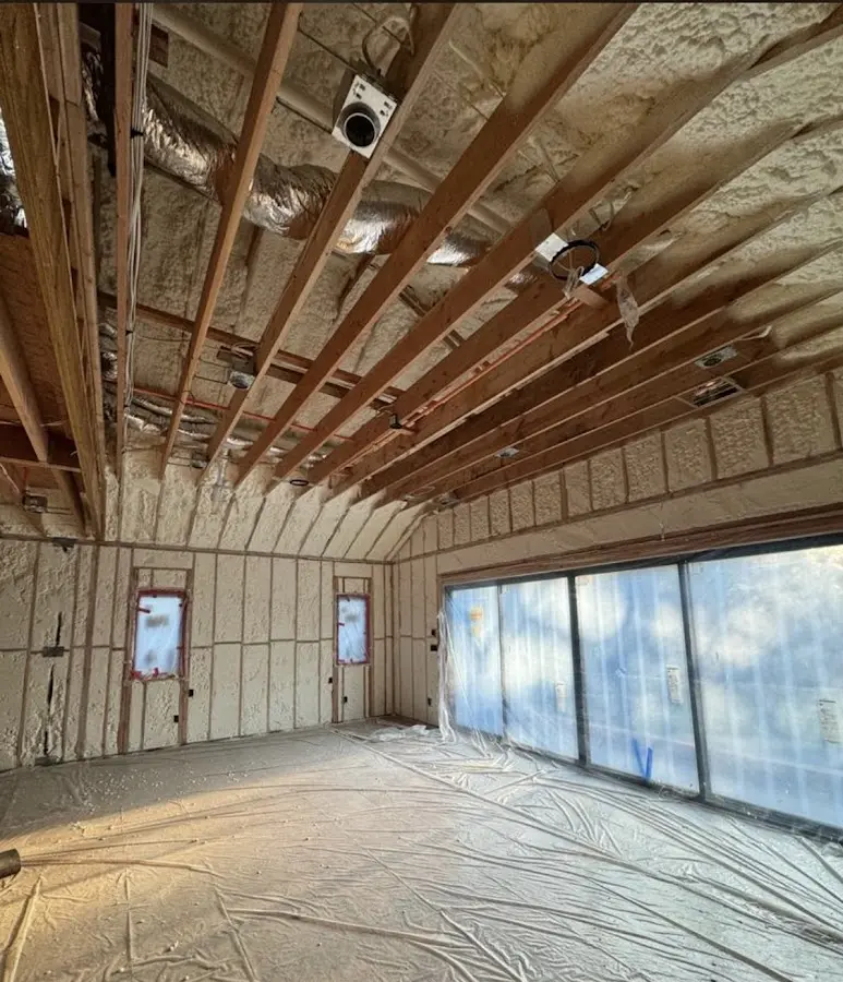 Interior walls and ceiling insulated with spray foam during new construction in Scituate